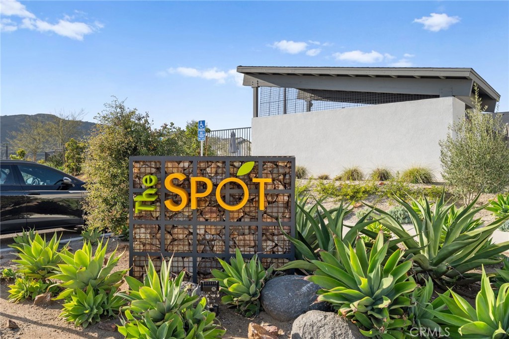 303 Sweet Place Fallbrook, CA 92028 - Photo 40 of 59 a sign that is on a brick wall