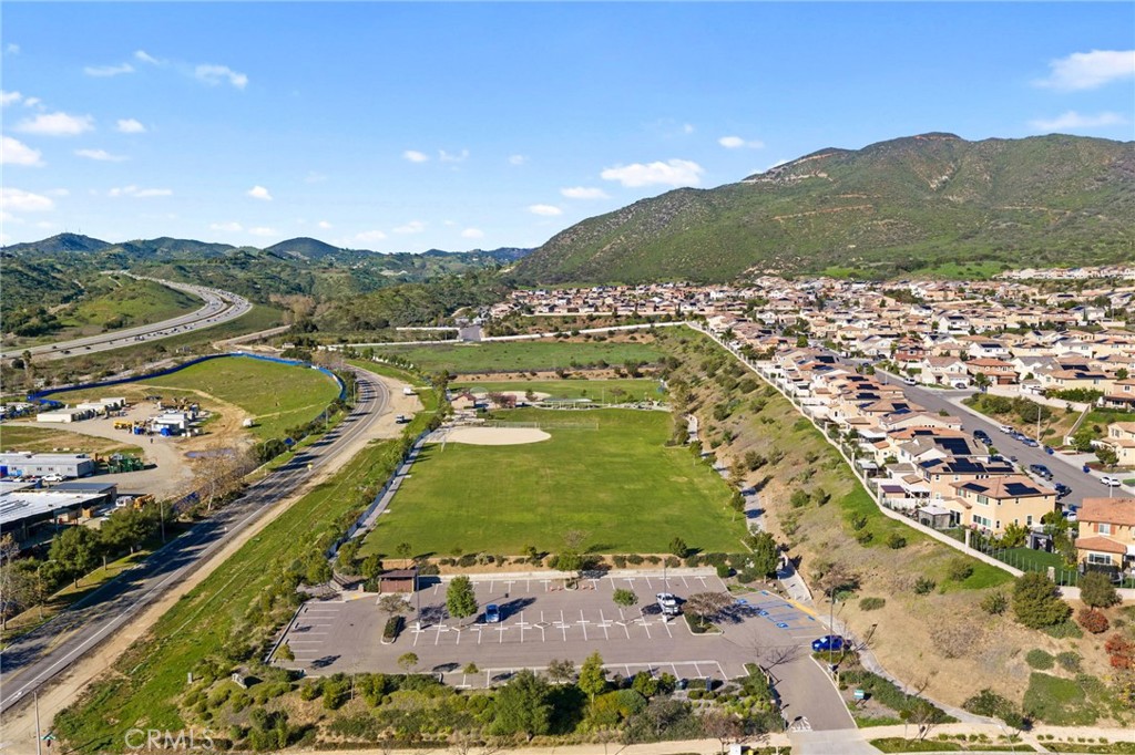 303 Sweet Place Fallbrook, CA 92028 - Photo 48 of 59 a view of a city with mountains in the background