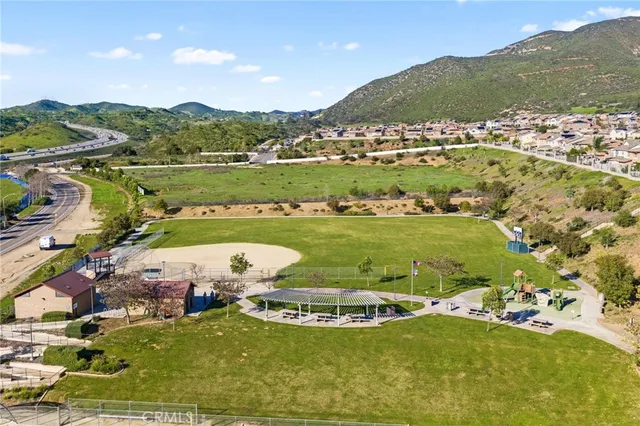 an aerial view of a house with a ocean view