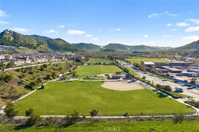 a view of a city with large trees