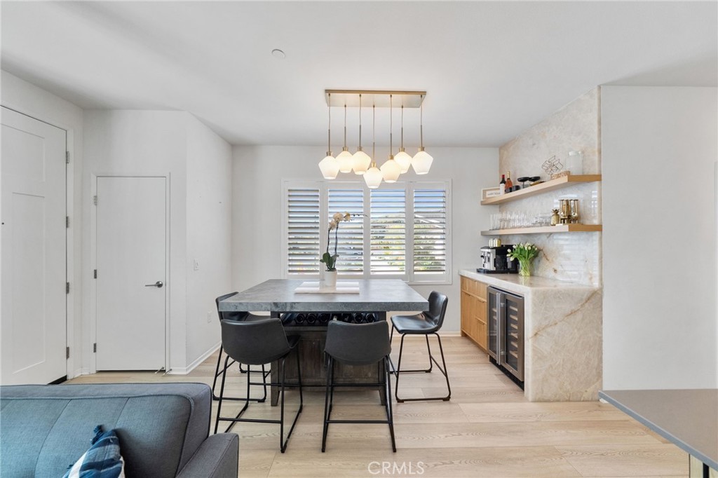 303 Sweet Place Fallbrook, CA 92028 - Photo 5 of 59 a view of a dining room with furniture window and wooden floor