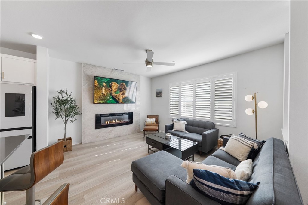 303 Sweet Place Fallbrook, CA 92028 - Photo 7 of 59 a living room with furniture and a flat screen tv