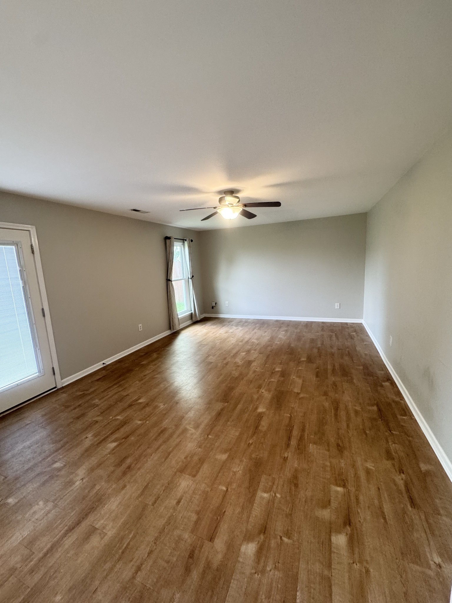 4017 Cadence Drive Spring Hill, TN 37174 - Photo 16 of 38 a view of empty room with wooden floor