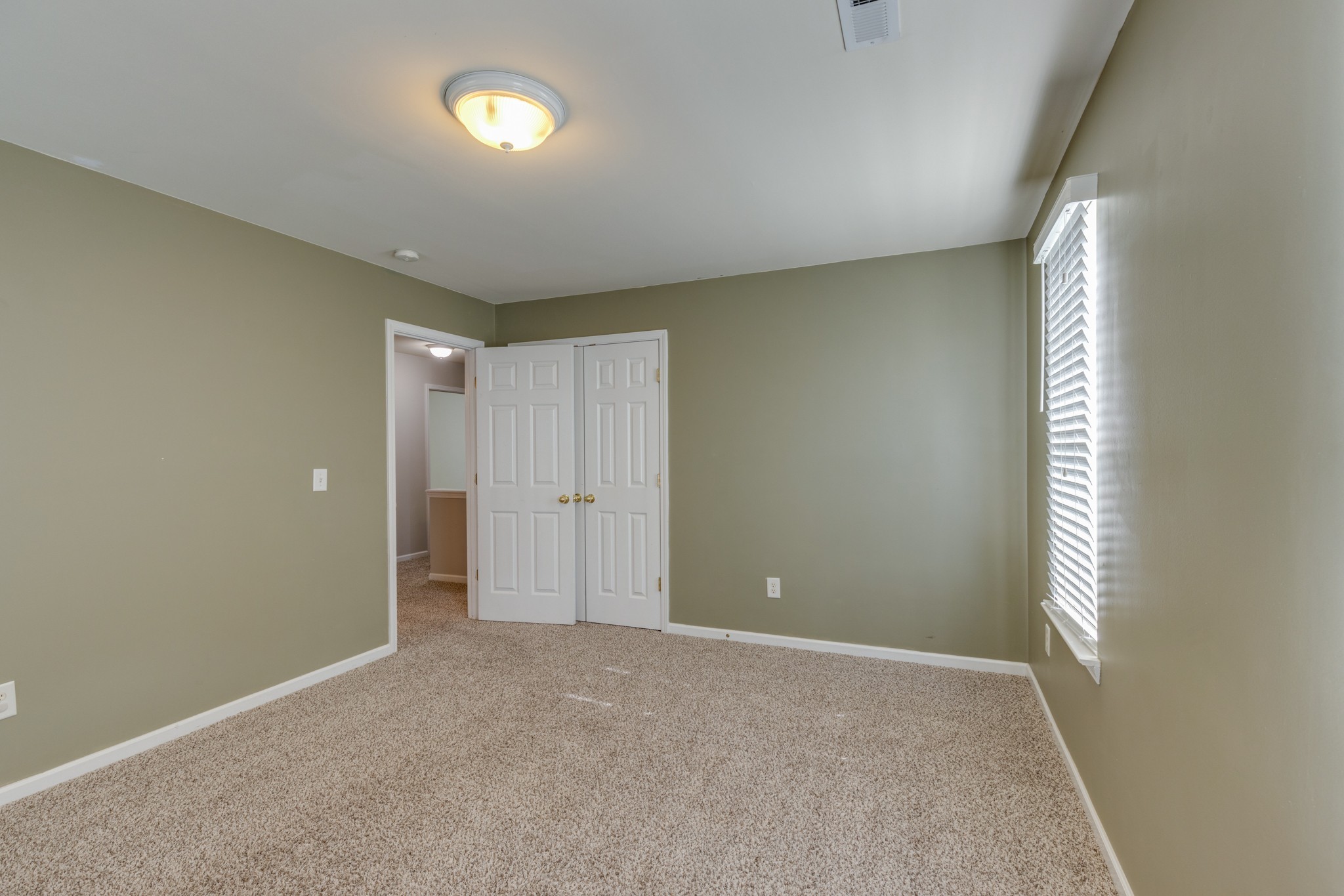 4017 Cadence Drive Spring Hill, TN 37174 - Photo 28 of 38 a view of an empty room with a window
