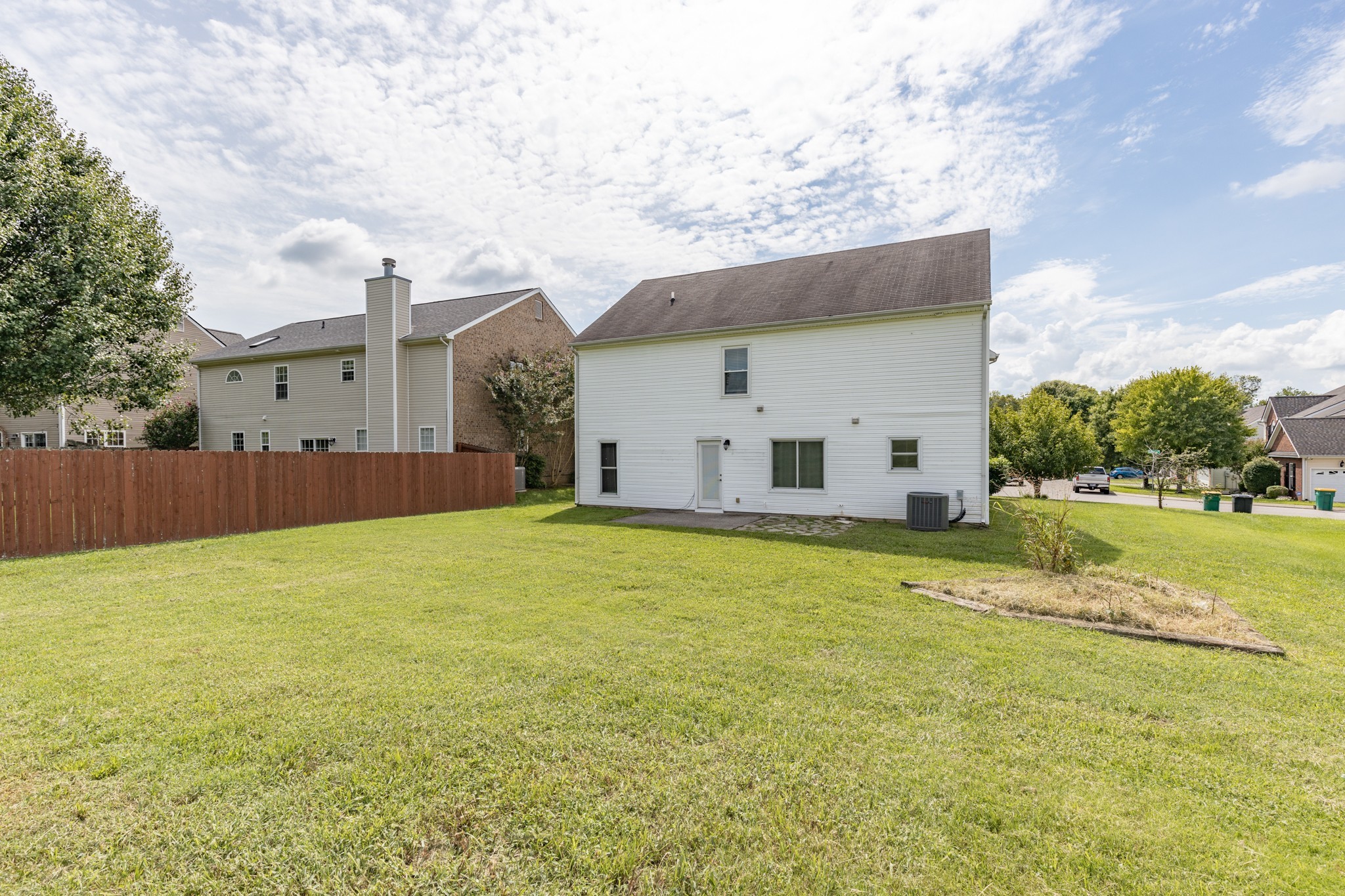 4017 Cadence Drive Spring Hill, TN 37174 - Photo 34 of 38 a view of a house with a yard and garage