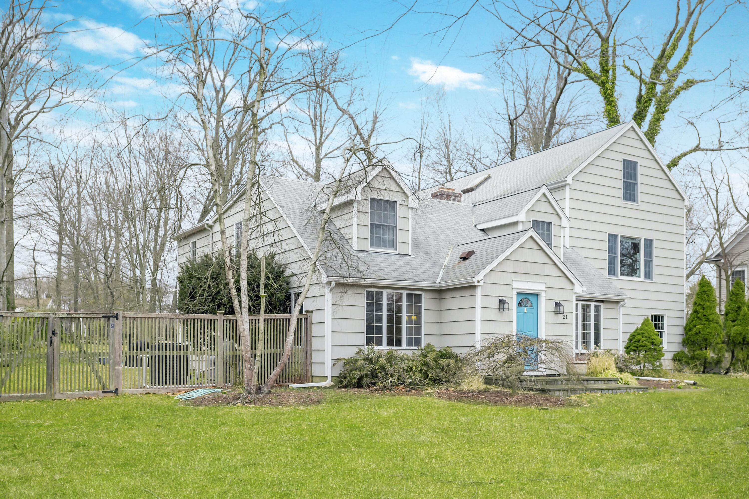 21 Revere Road Darien, CT 06820 - Photo 1 of 40 a front view of a house with a yard