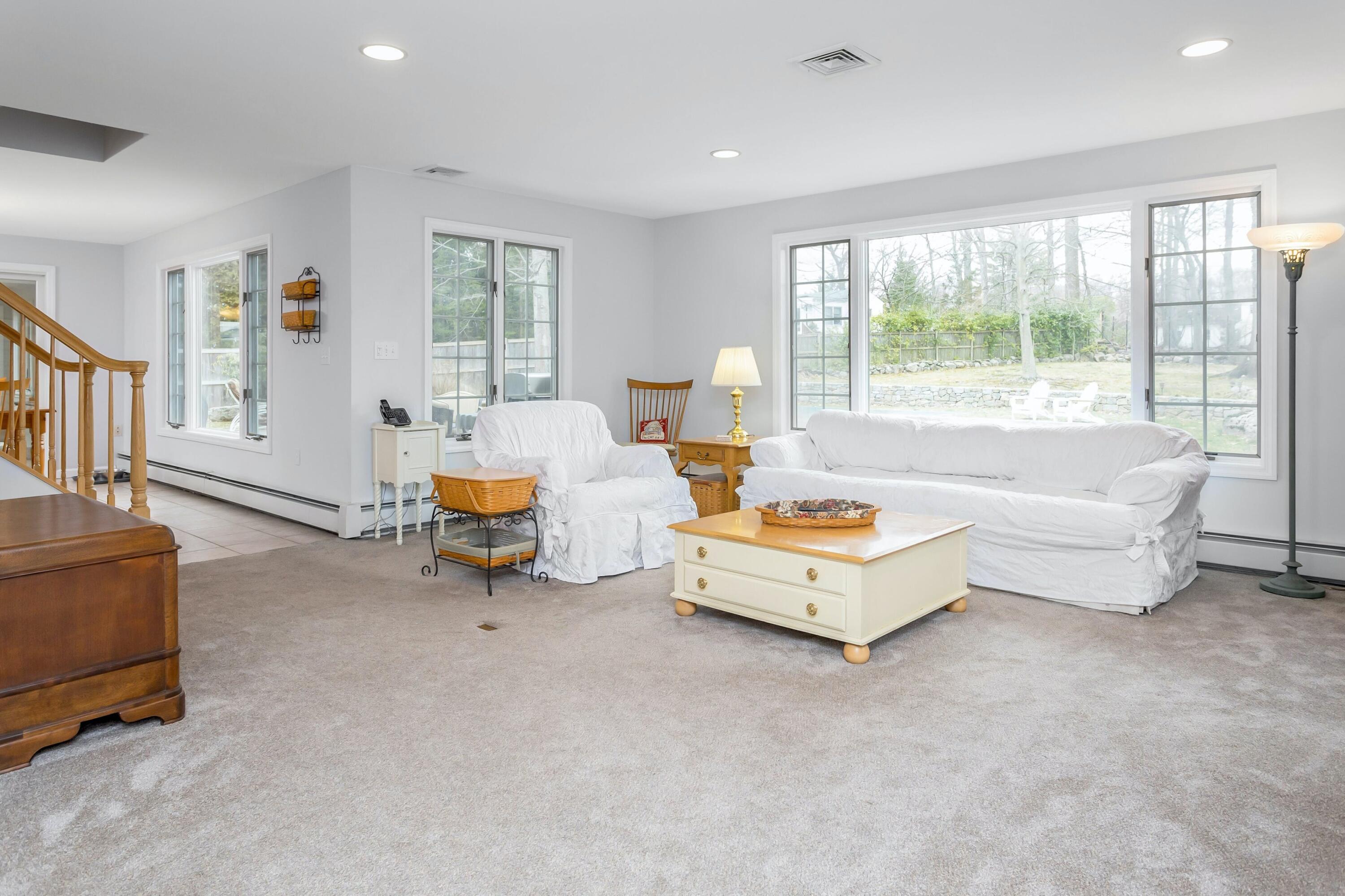 21 Revere Road Darien, CT 06820 - Photo 14 of 40 a living room with furniture and a large window
