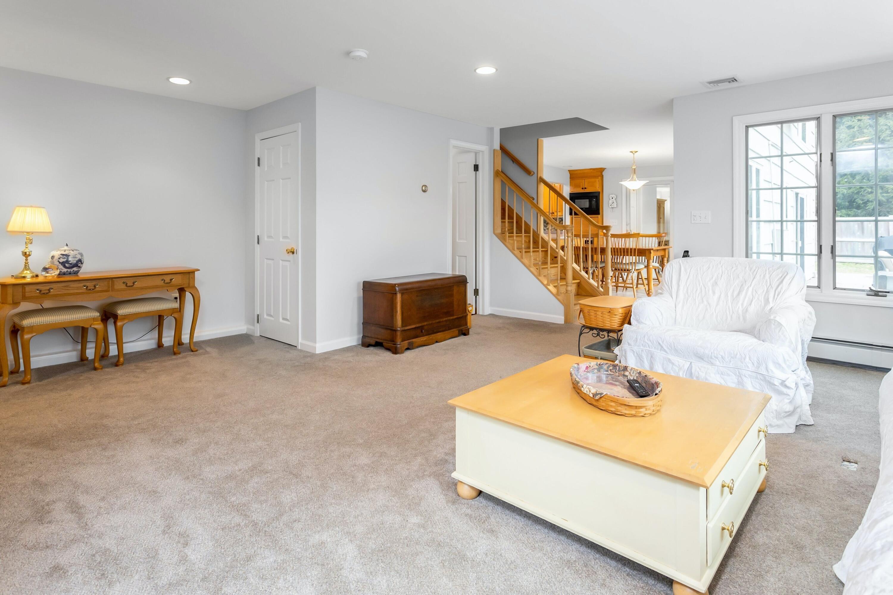 21 Revere Road Darien, CT 06820 - Photo 16 of 40 a living room with furniture and a wooden floor