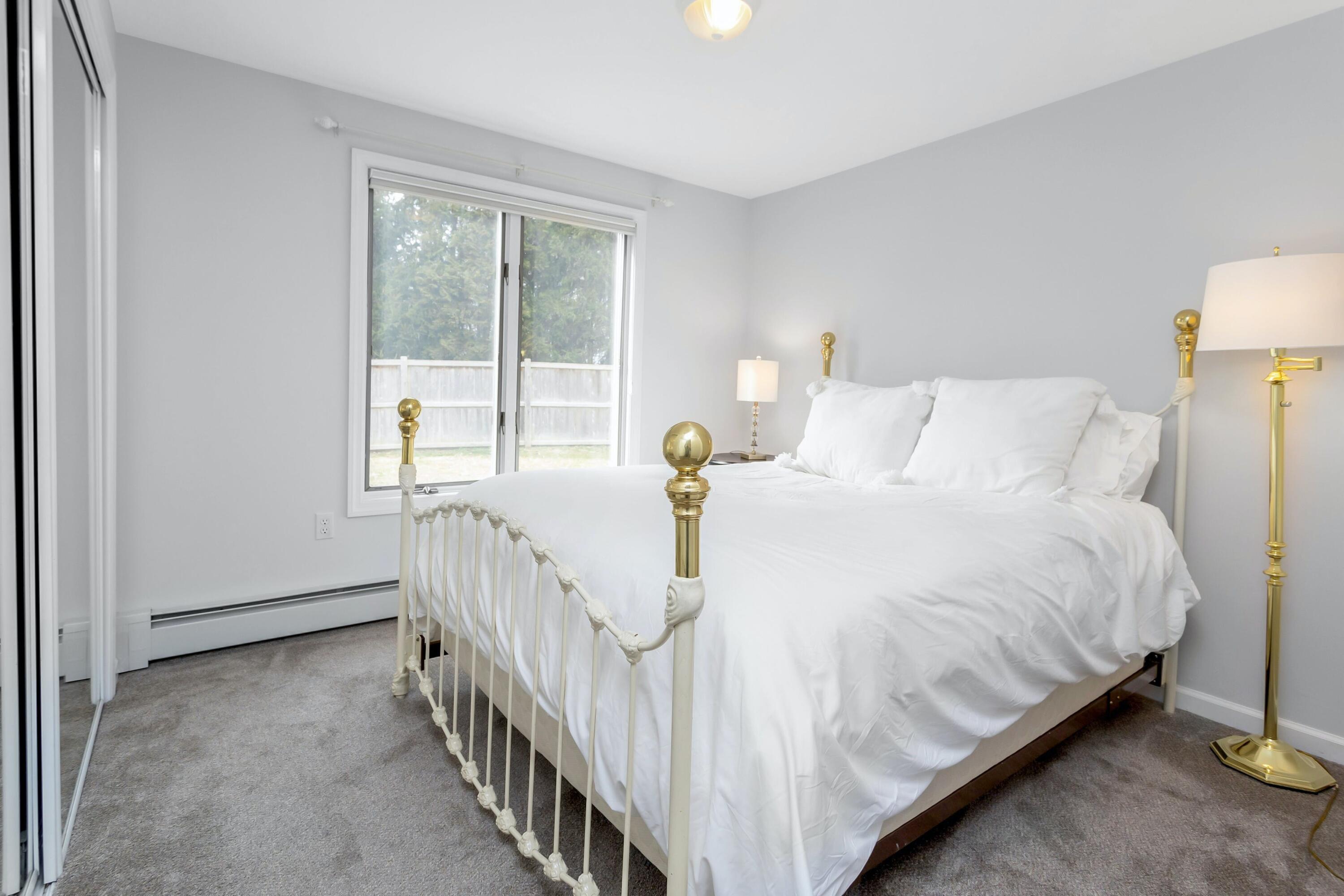 21 Revere Road Darien, CT 06820 - Photo 26 of 40 a bedroom with a bed and a table