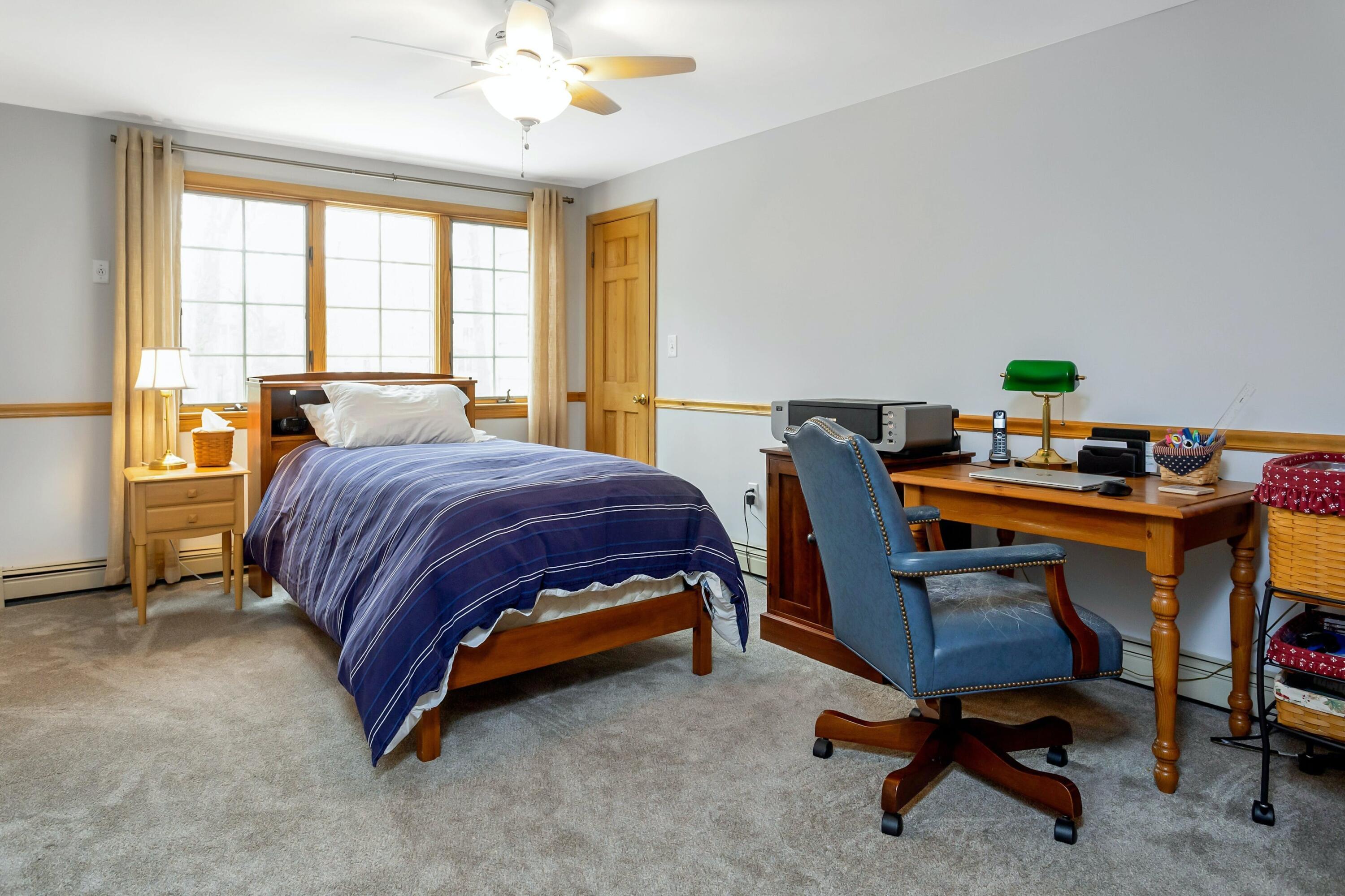 21 Revere Road Darien, CT 06820 - Photo 31 of 40 a bedroom with a bed and a desk