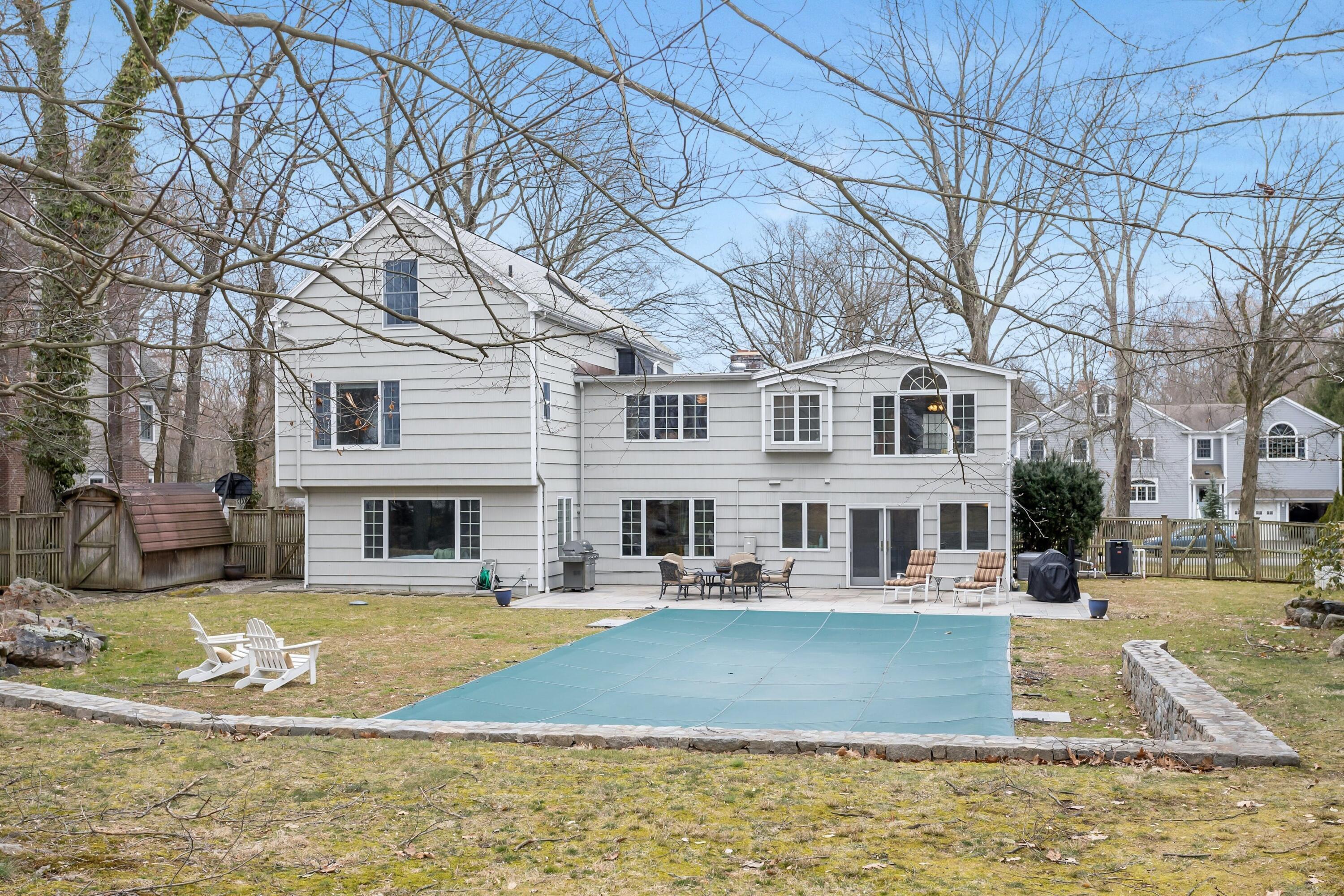 21 Revere Road Darien, CT 06820 - Photo 38 of 40 a view of pool with brick walls