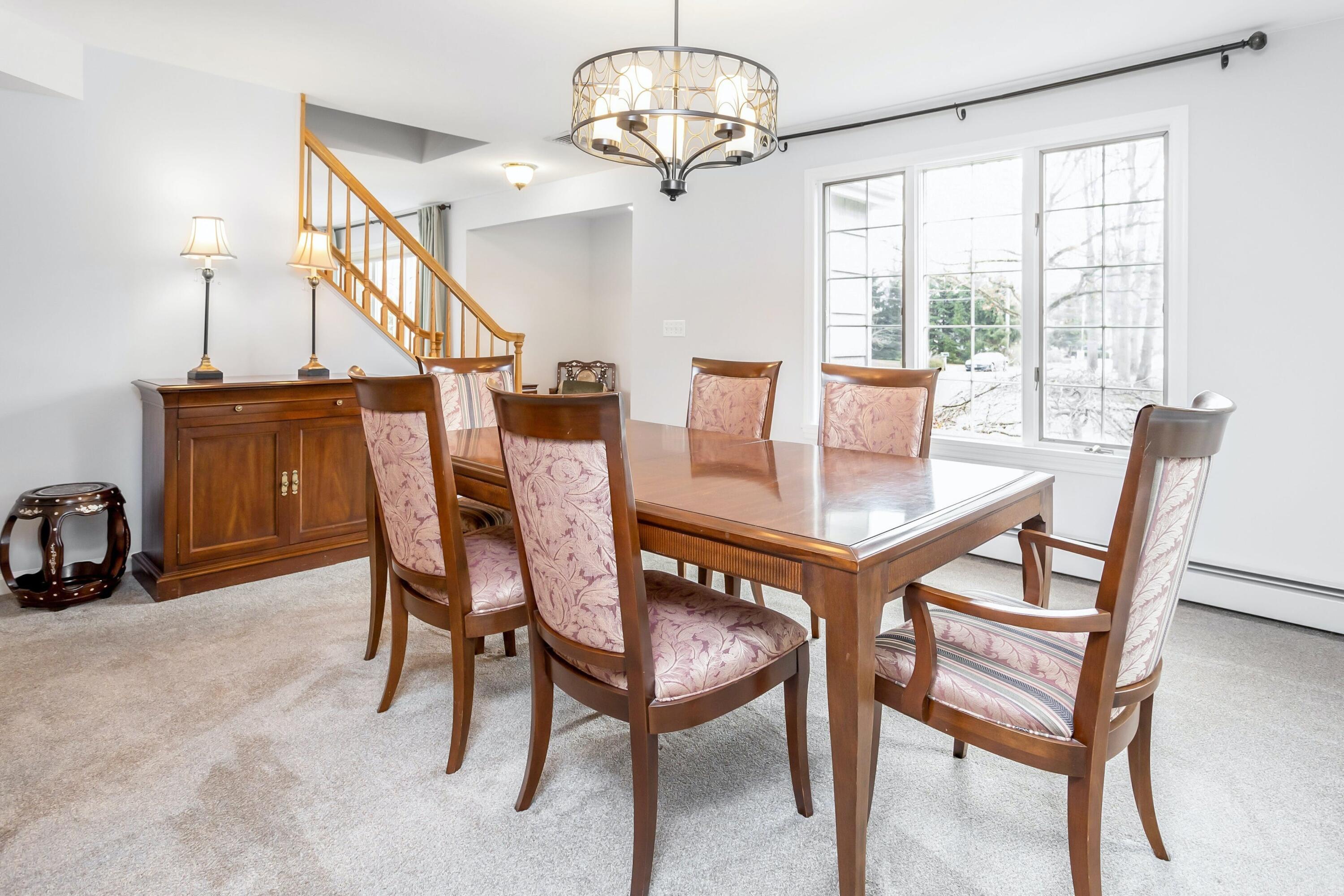 21 Revere Road Darien, CT 06820 - Photo 7 of 40 a view of a dining room with furniture window and outside view