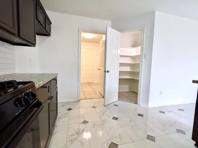 a kitchen with a stove