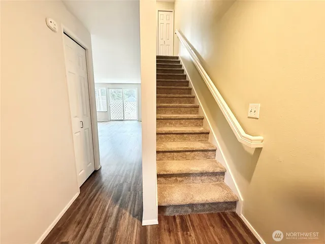 a view of a room with a hallway