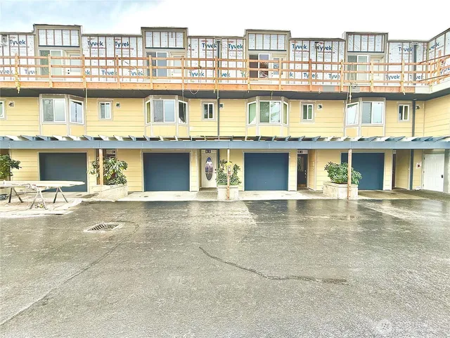 a view of a bathroom with a sink and a mirror