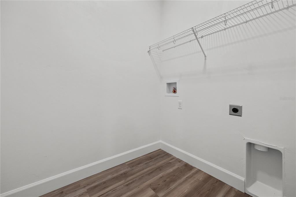 1100 Southwest 67th Drive Gainesville, FL 32607 - Photo 24 of 27 a view of a small space with wooden floor