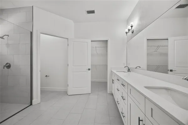 a view of an empty walk in closet