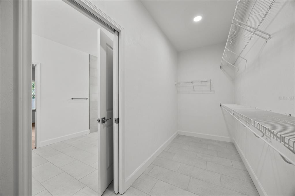 1100 Southwest 67th Drive Gainesville, FL 32607 - Photo 9 of 27 a view of an empty walk in closet