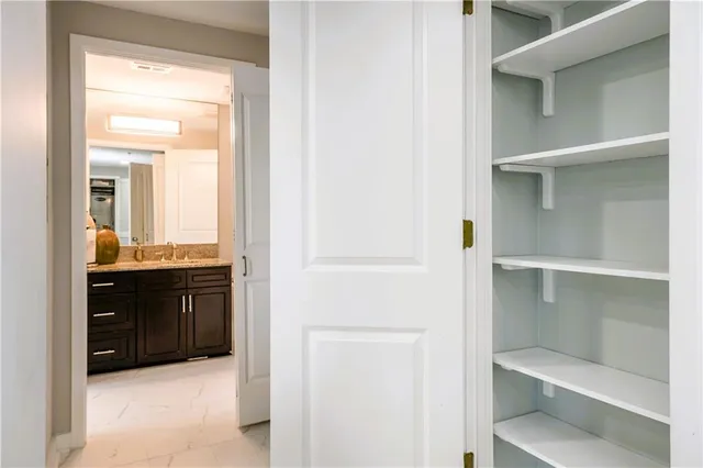 a en suite bathroom with a sink and vanity
