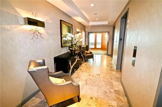 a view of a living room with furniture