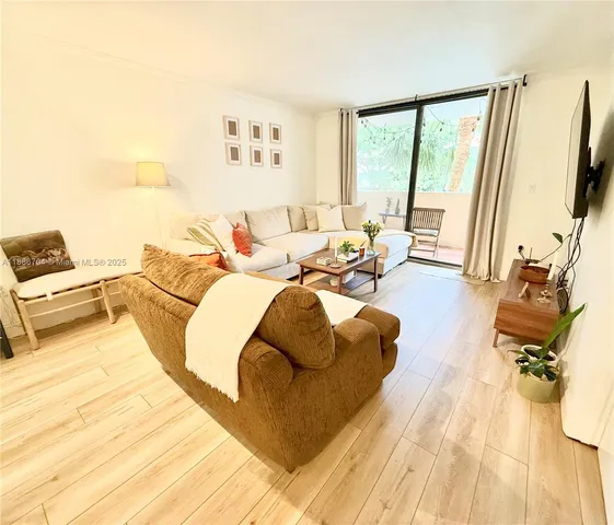 a bed room with a bed and a night stand