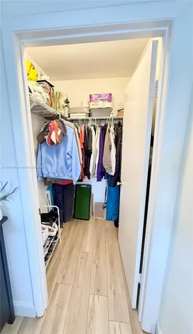 a bathroom with a sink toilet a mirror and shower