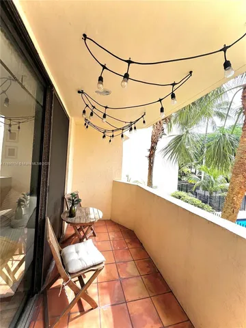 a view of a outdoor space with a swimming pool