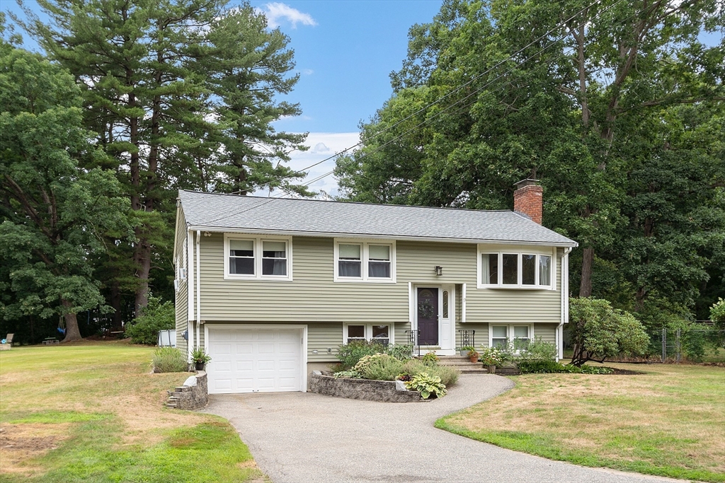 9 Springwell Road Billerica, MA 01821 - Photo 1 of 37 front view of a house with a yard