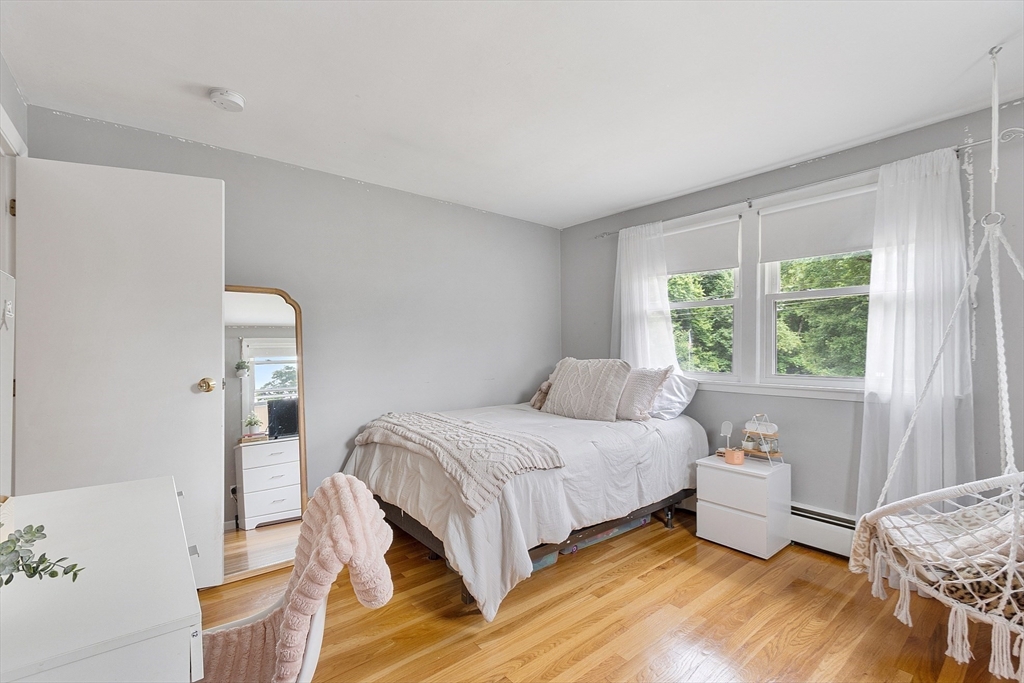 9 Springwell Road Billerica, MA 01821 - Photo 19 of 37 a bedroom with a bed and a window
