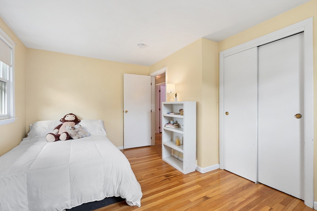 9 Springwell Road Billerica, MA 01821 - Photo 21 of 37 a bedroom with a bed and a closet