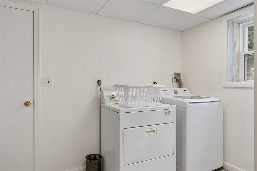 9 Springwell Road Billerica, MA 01821 - Photo 27 of 37 a utility room with dryer and washer