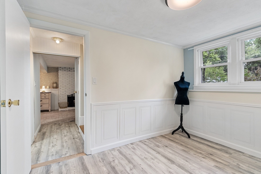 9 Springwell Road Billerica, MA 01821 - Photo 31 of 37 a view of hallway with a small yard