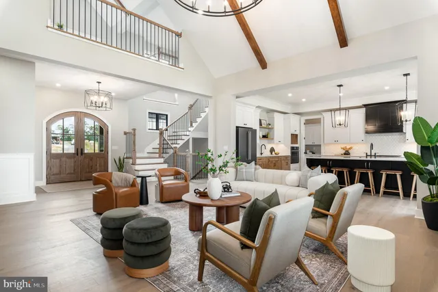 a kitchen with stainless steel appliances granite countertop a stove and a wooden floors