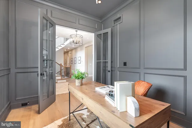 a kitchen with a sink and wooden cabinets