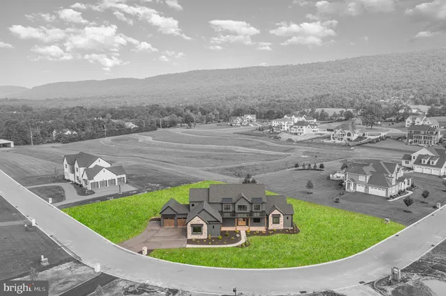 a view of a swimming pool with an outdoor seating