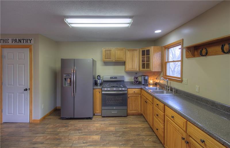 800 Planter Drive Rochester, PA 15074 - Photo 6 of 24 New slate appliances. Nice pantry. Ample counterspace. Canned LED lights.