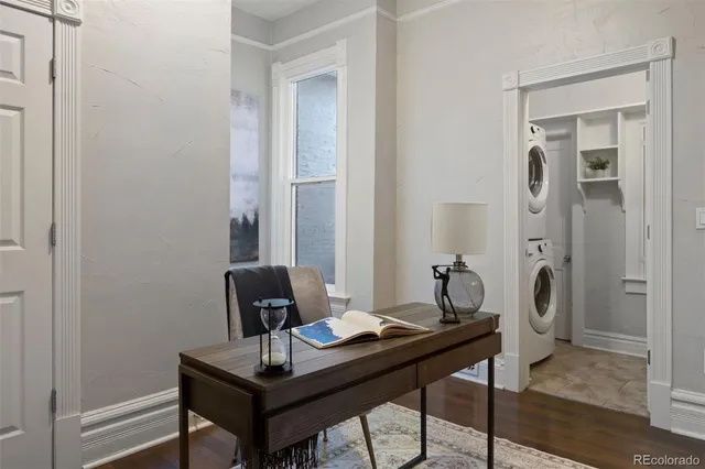 a view of a workspace with furniture