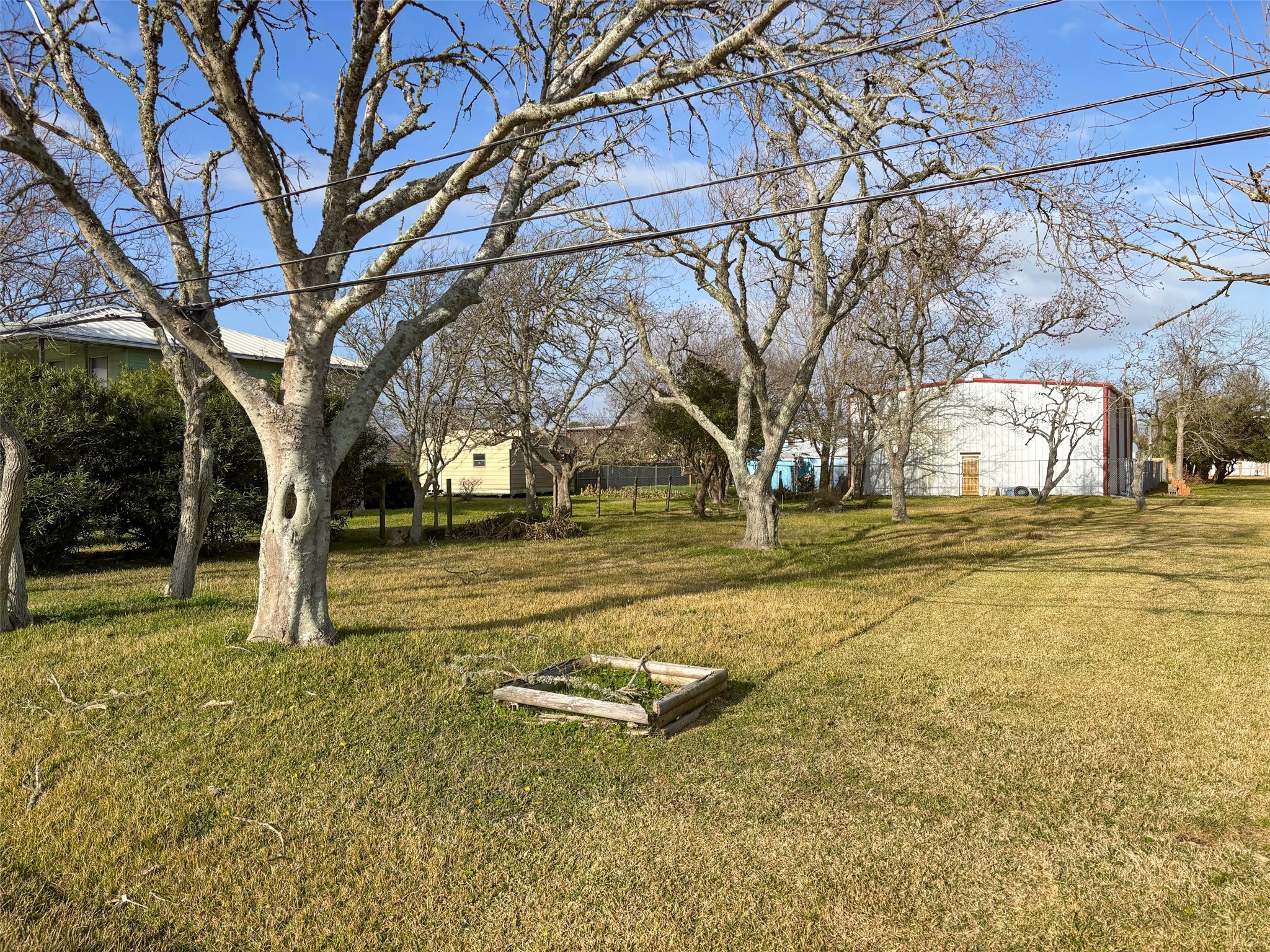 a view of yard with swimming pool