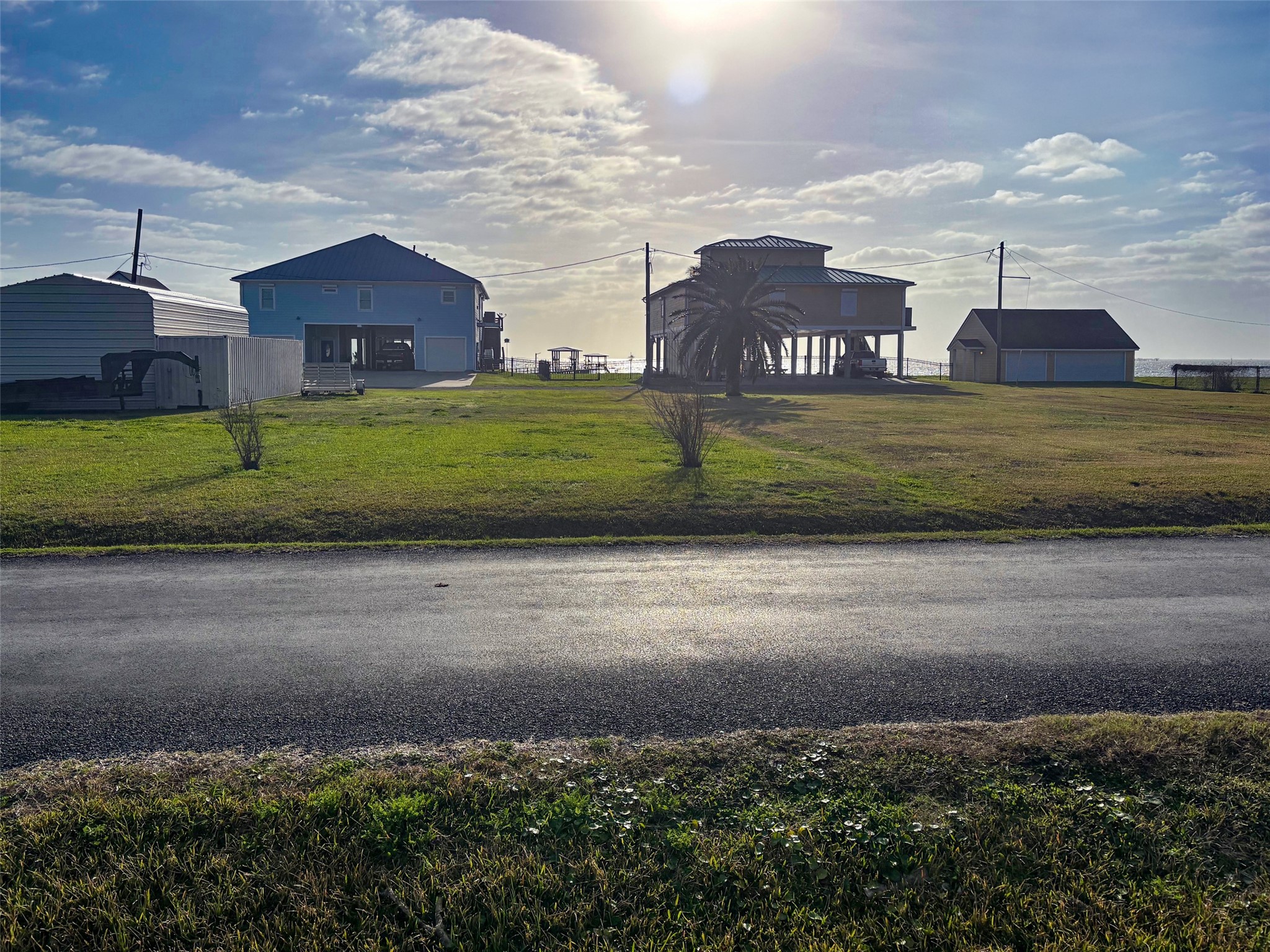 Tbd 4th Street Dickinson, TX 77539 - Photo 4 of 6 a view of a house with a big yard and a large parking space