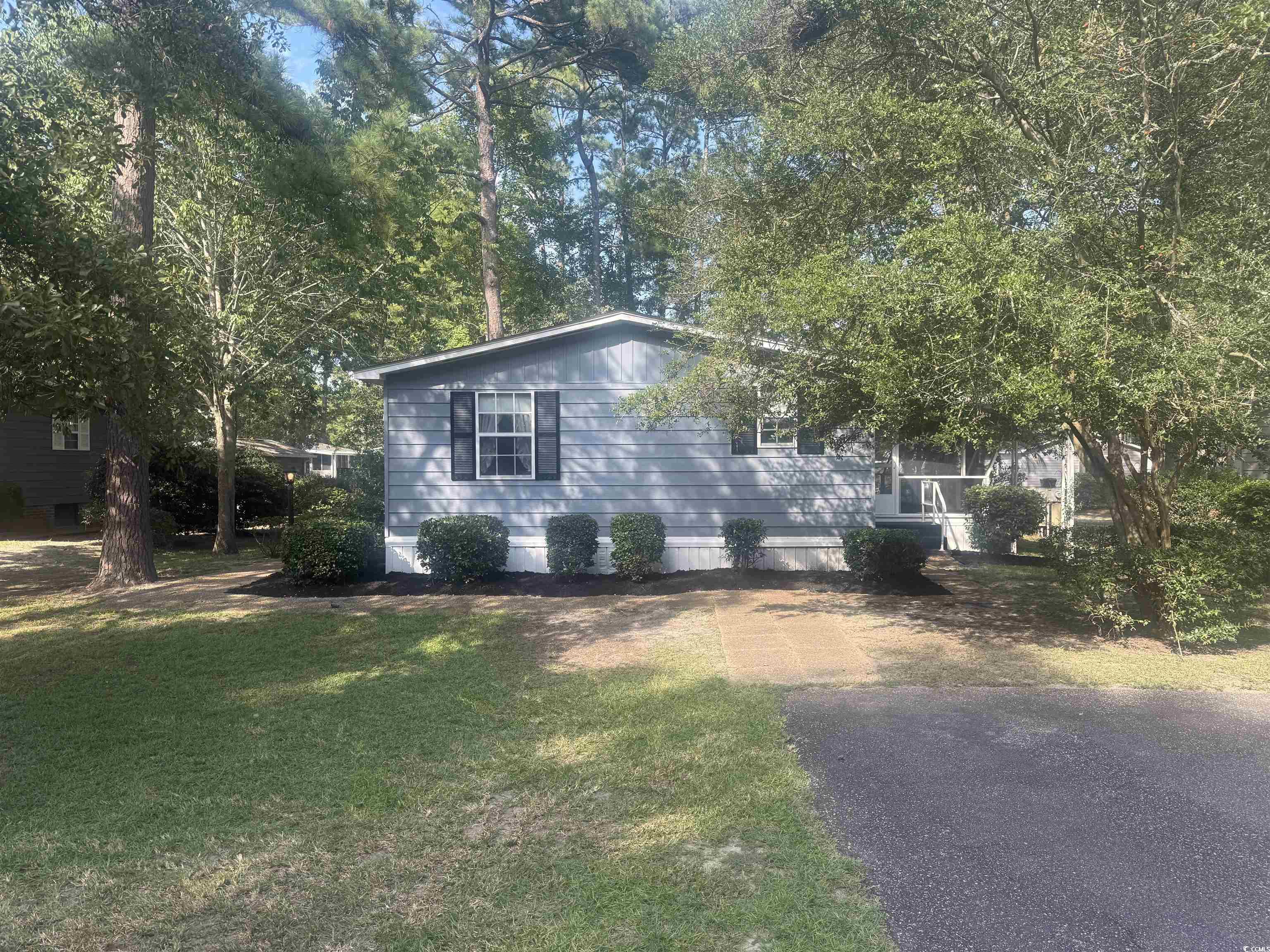 View of front of house with a front lawn