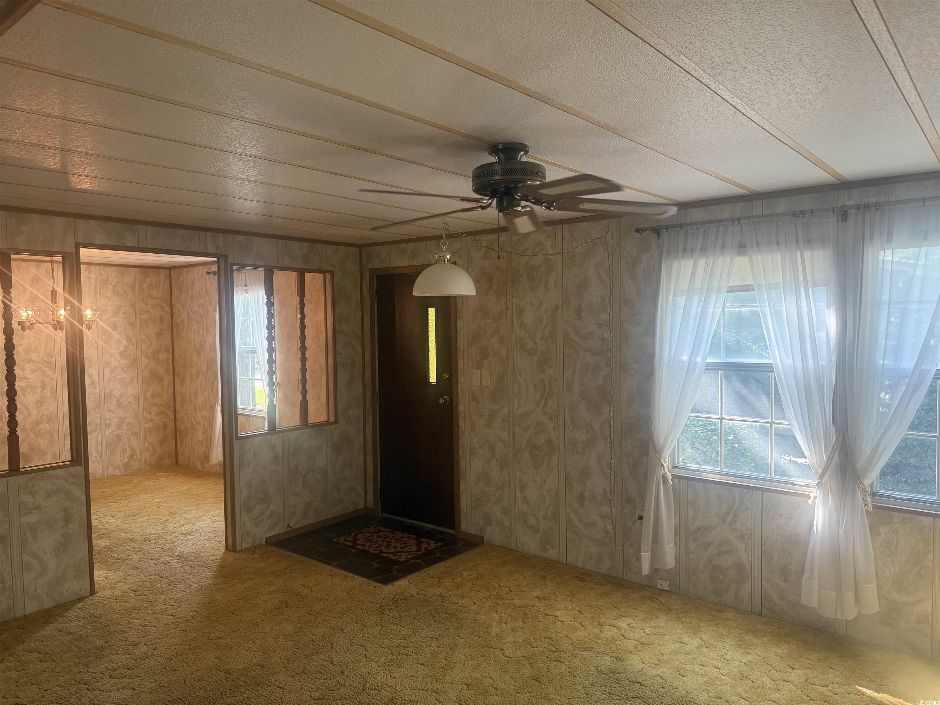 712 Raleigh Trail Murrells Inlet, SC 29576 - Photo 11 of 32 View of unfurnished sunroom