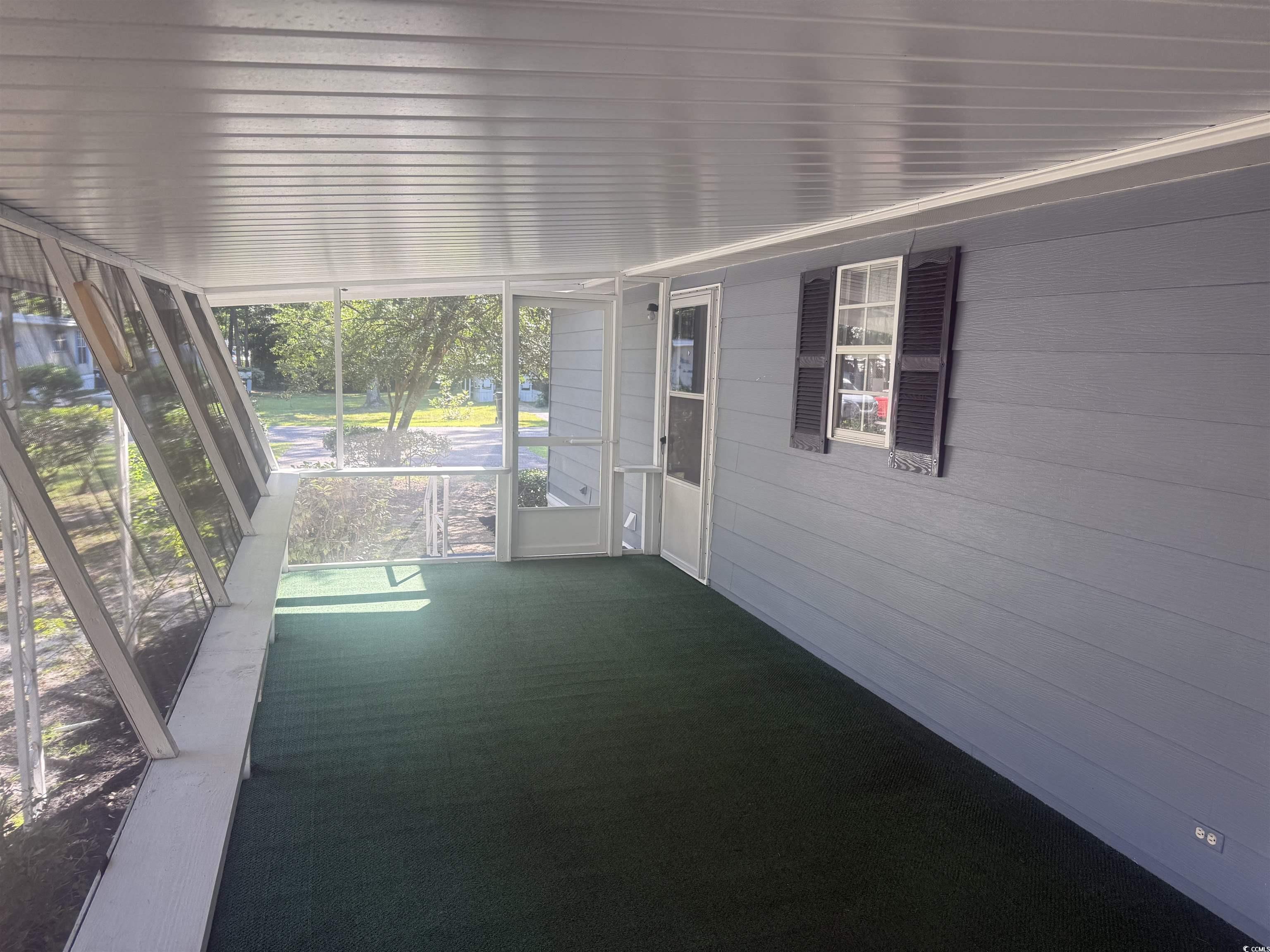 712 Raleigh Trail Murrells Inlet, SC 29576 - Photo 9 of 32 View of unfurnished sunroom