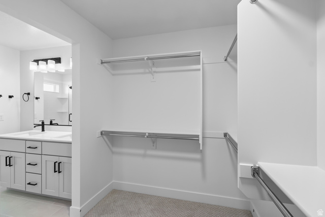 2770 West Aurora Avenue Mapleton, UT 84664 - Photo 10 of 16 Walk in closet featuring a sink and light tile patterned floors