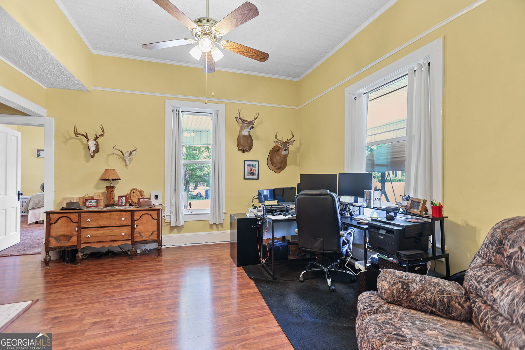 1205 Terrell Street Greenville, GA 30222 - Photo 11 of 50 a living room with furniture and a wooden floor