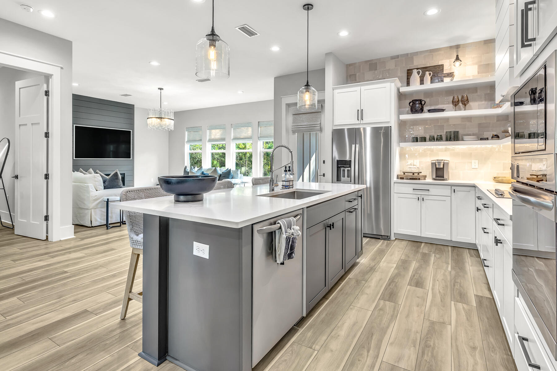 106 Marlberry Santa Rosa Beach Santa Rosa Beach, FL 32459 - Photo 14 of 37 a kitchen with stainless steel appliances granite countertop a sink and a refrigerator