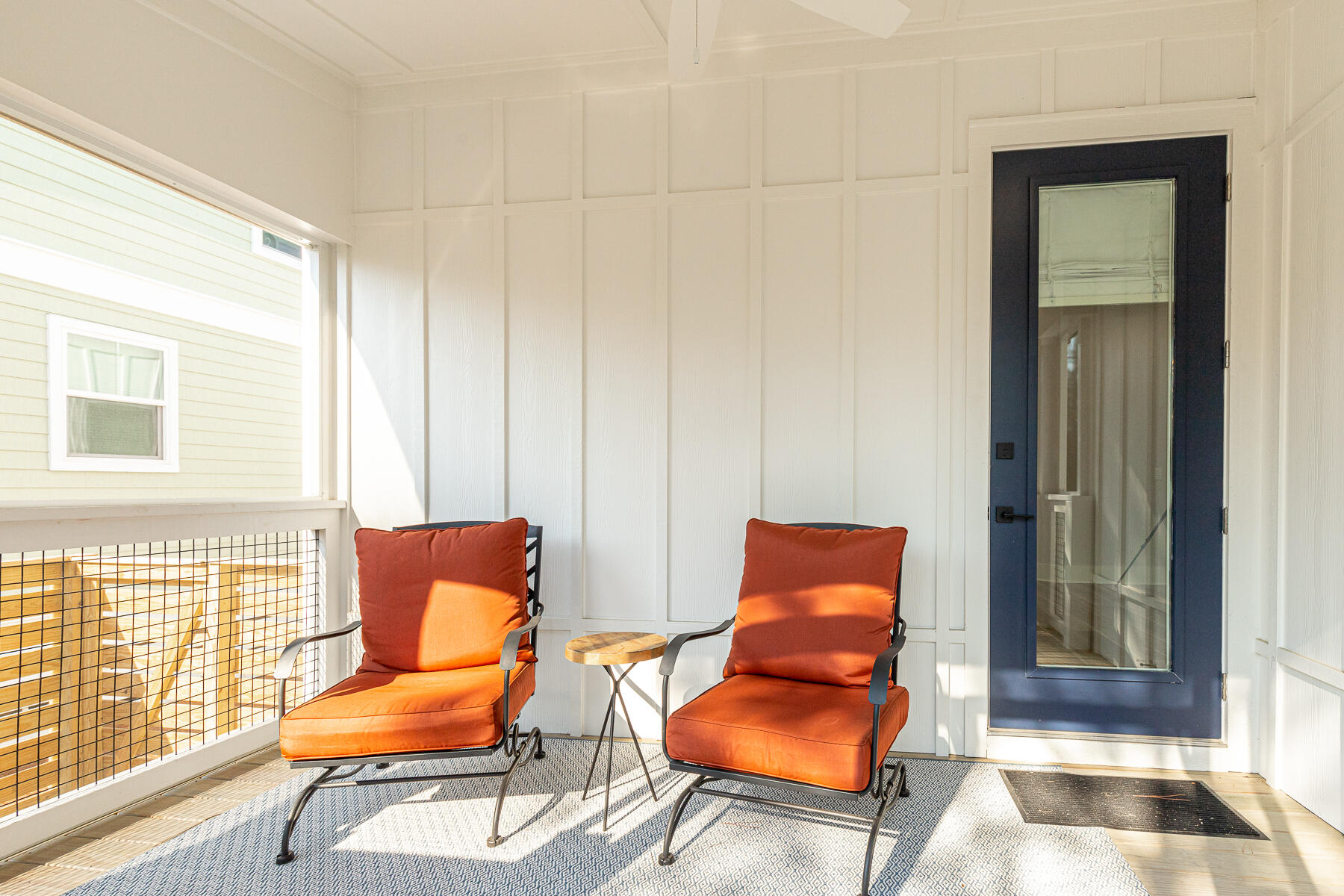 106 Marlberry Santa Rosa Beach Santa Rosa Beach, FL 32459 - Photo 19 of 37 a blue chair sitting in front of a window