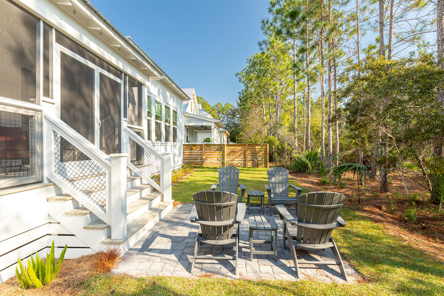 106 Marlberry Santa Rosa Beach Santa Rosa Beach, FL 32459 - Photo 21 of 37 a view of a swimming pool with outdoor seating and plants