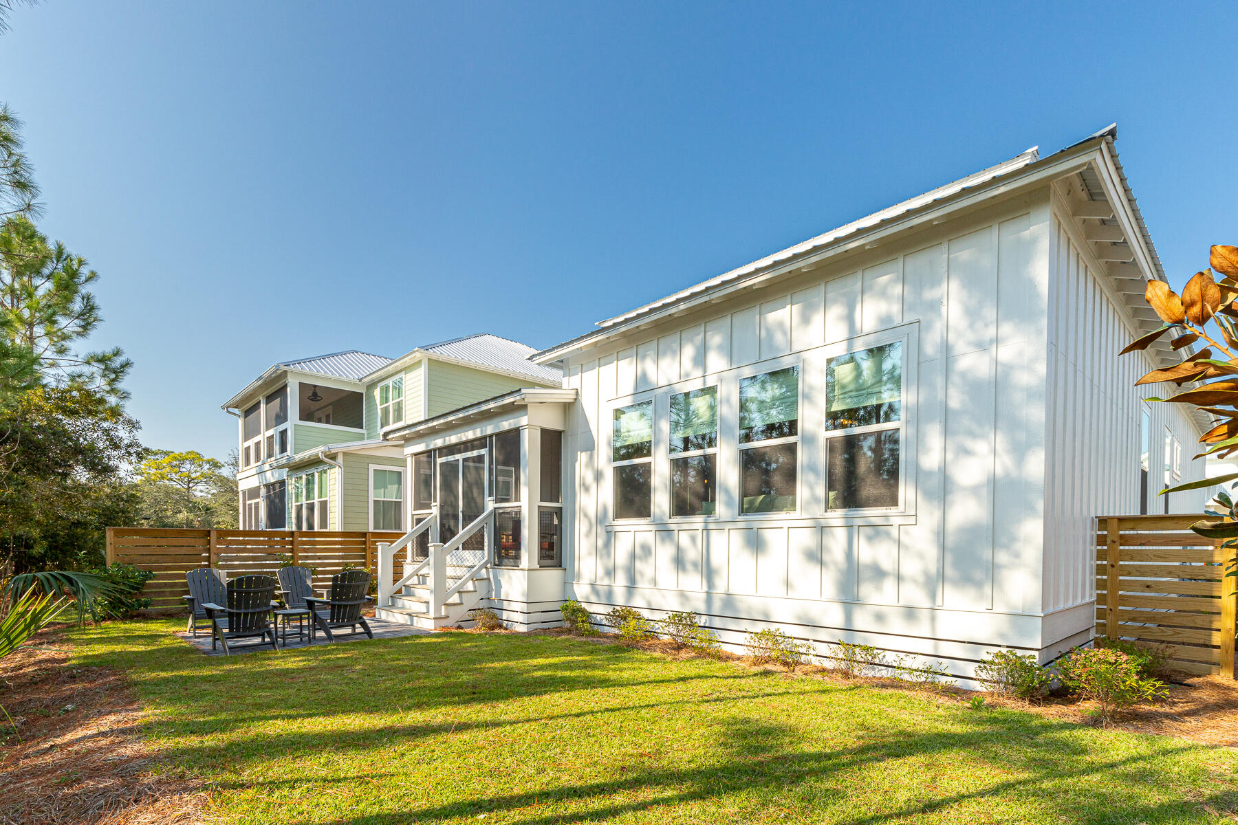 106 Marlberry Santa Rosa Beach Santa Rosa Beach, FL 32459 - Photo 23 of 37 a front view of a house with a yard