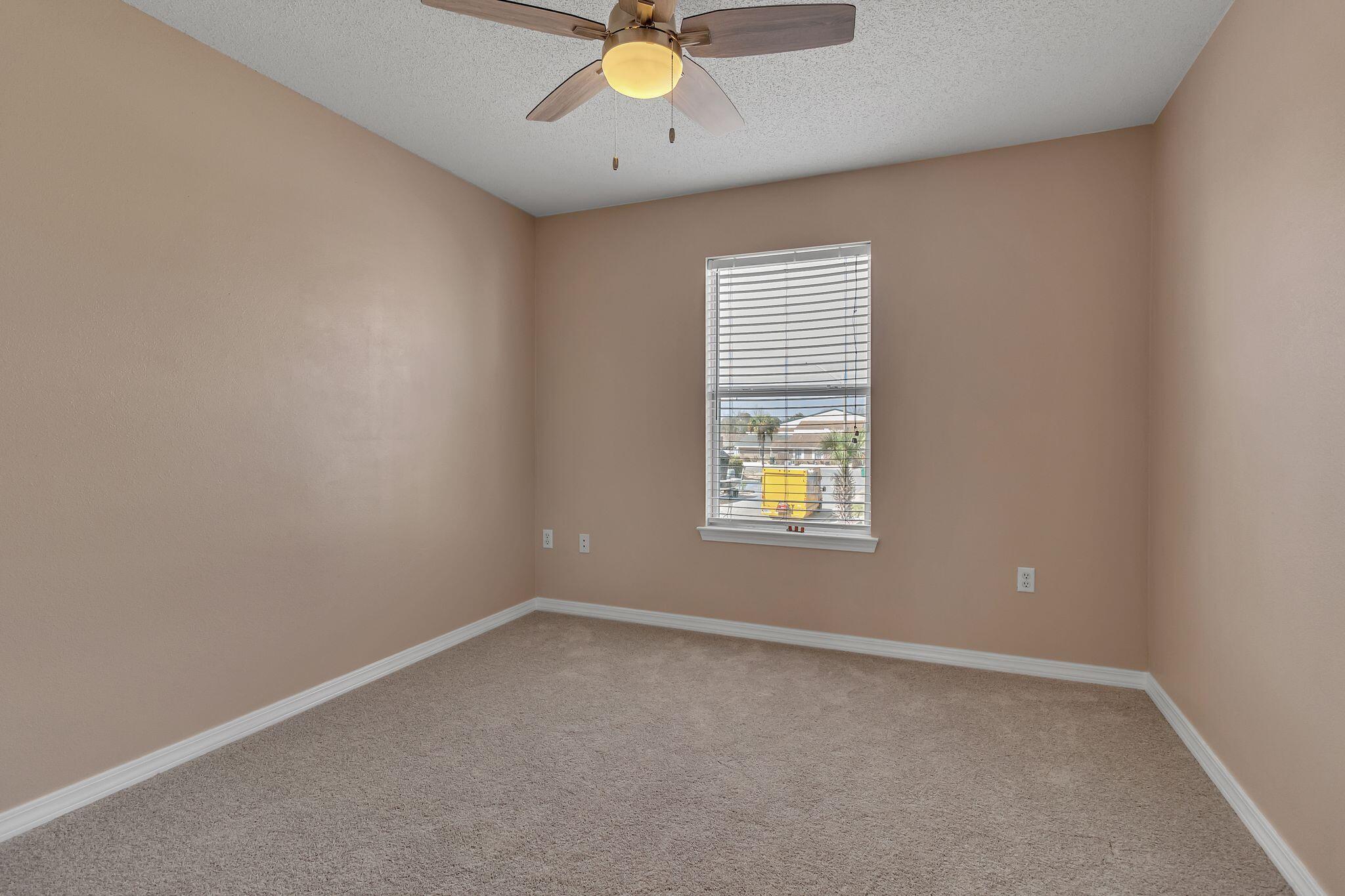 150 Bent Arrow Drive, Unit 51 Destin, FL 32541 - Photo 17 of 28 an empty room with a window