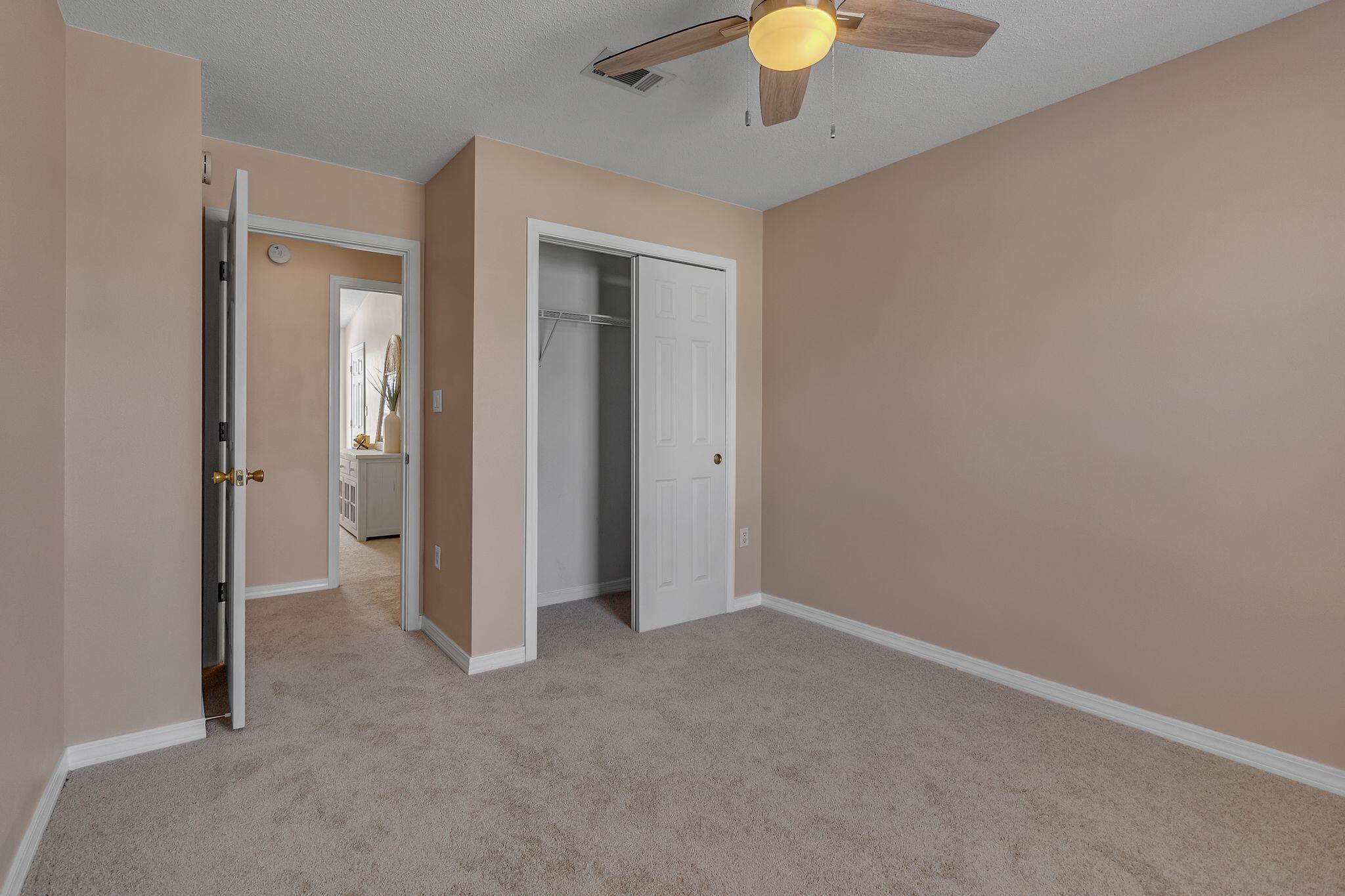 150 Bent Arrow Drive, Unit 51 Destin, FL 32541 - Photo 20 of 28 an empty room with a bathroom